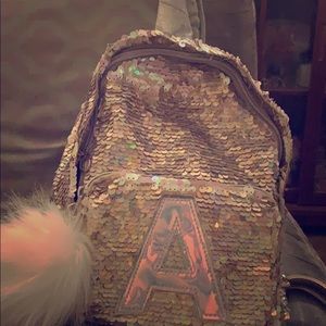 unicorn backpack from justice and it is sequence